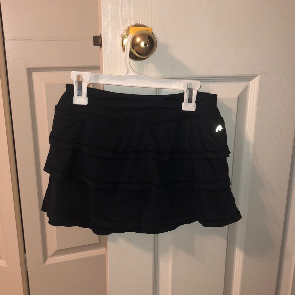 black mini tennis skirt